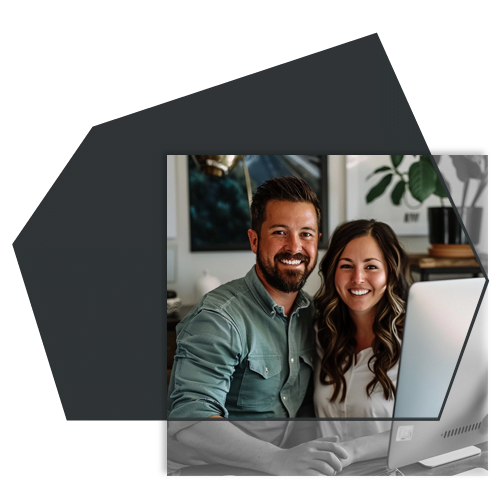 A happy couple focusing on their business thanks to the marketing services of Obsidian Atlas.